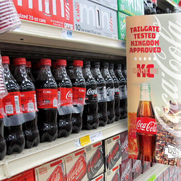 coke design on shelf at supermarket