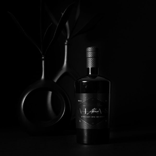Alias Bottle with Black Vases