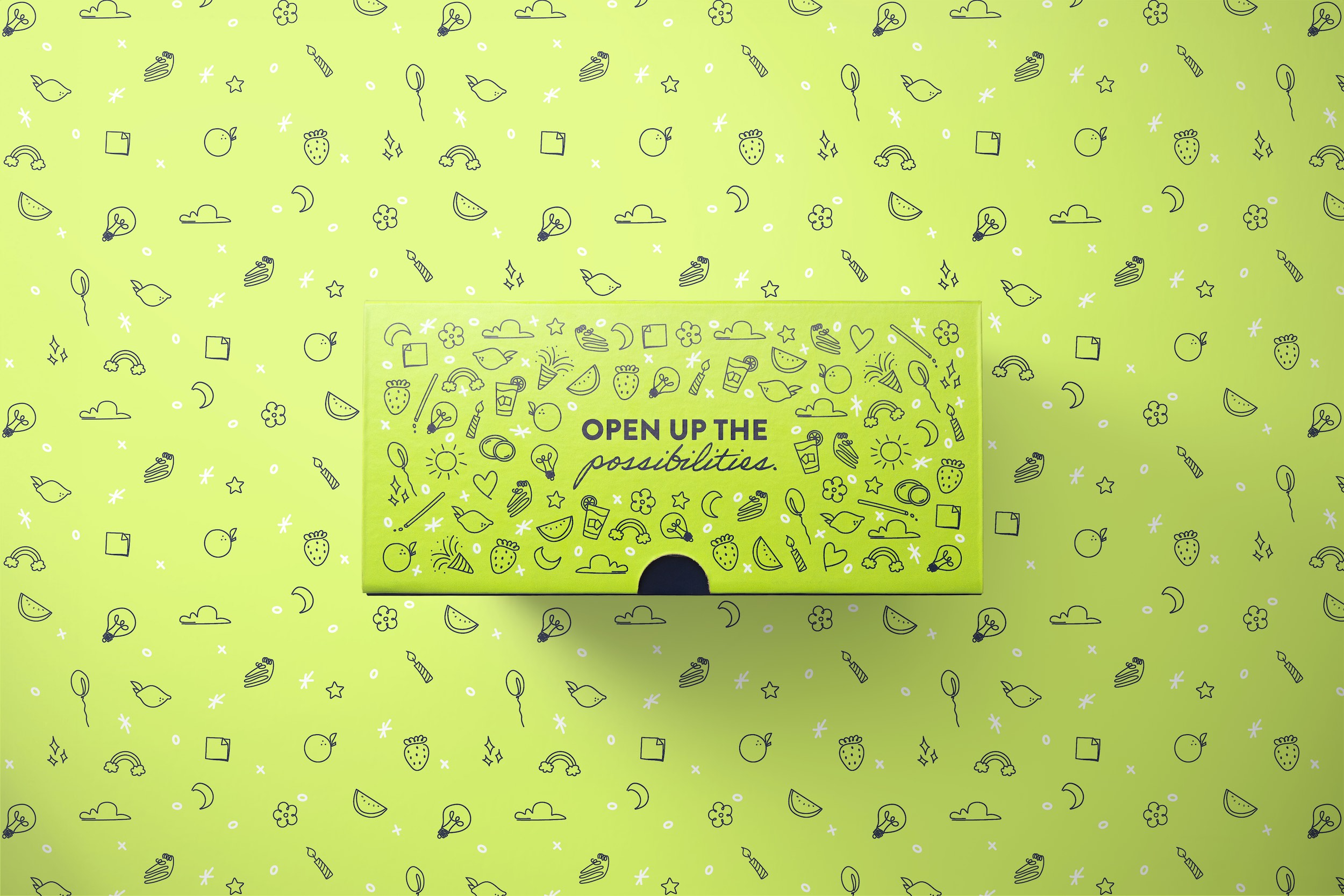 A bright green press kit box that reads 