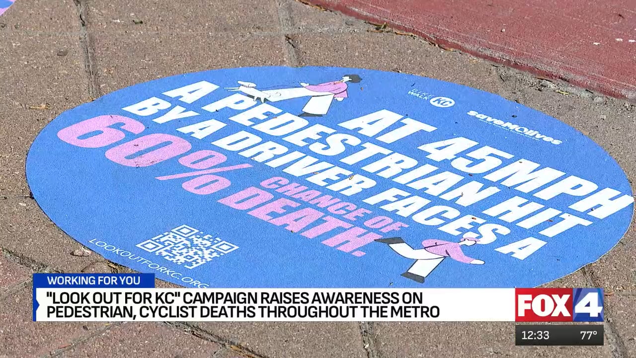 Video still from Fox4 news coverage showing Look Out For KC sidewalk decal