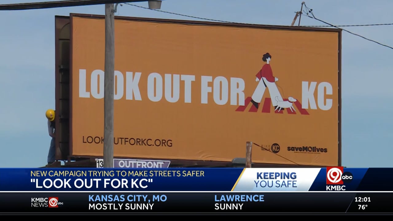 Video still from KMBC 9 news coverage showing Look Out For KC billboard