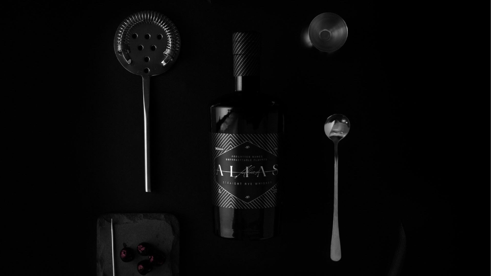 Alias Whiskey bottle and bartending supplies